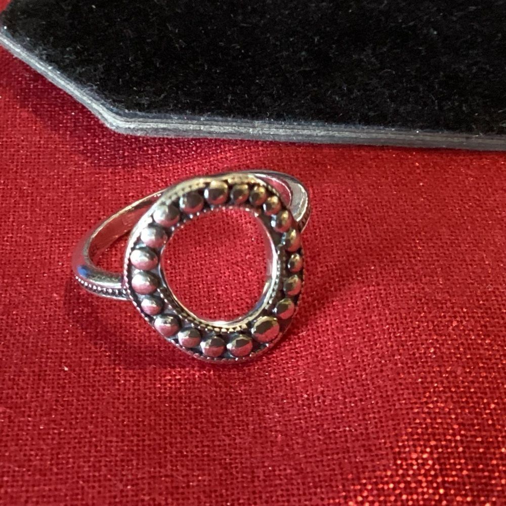 Elegant Sterling Silver Ring with Black Accents